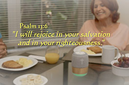 Woman listening to prayers from My MoodBible™ at breakfast